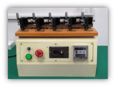 Sliding-type durability testing machine